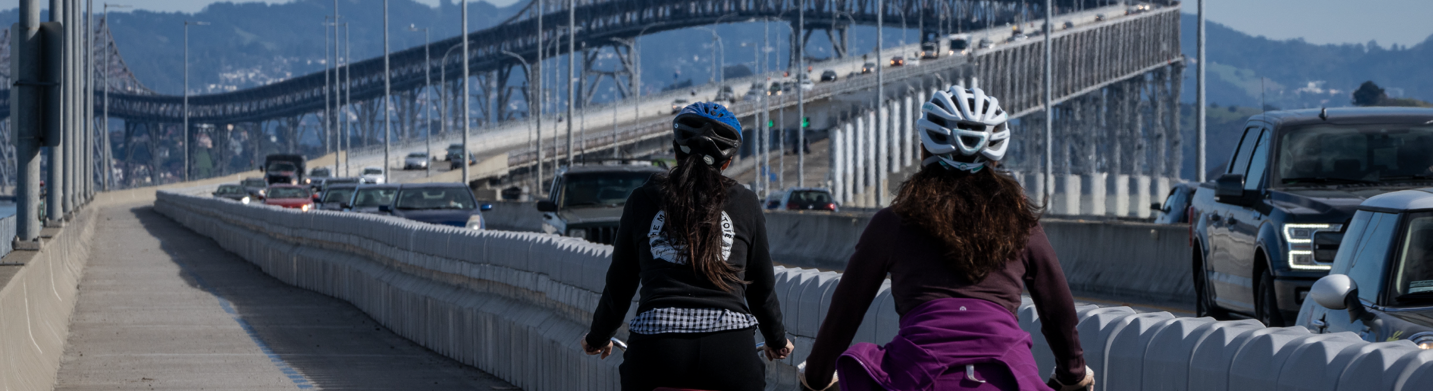 2022 Annual Report Cover image of bridge and bicyclists