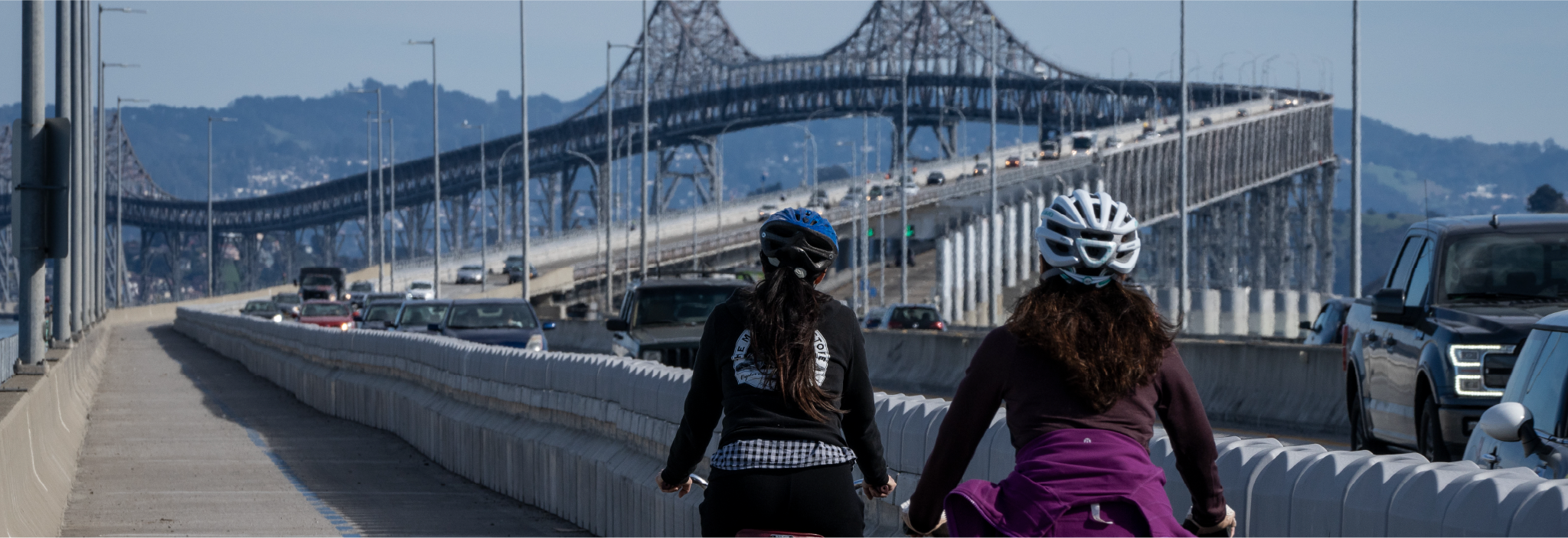 2022 Annual Report Cover image of bridge and bicyclists