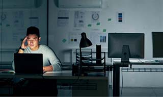 COVID-19 Permitting Man at computer