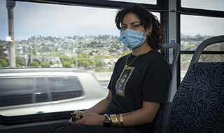 Woman with mask commuting