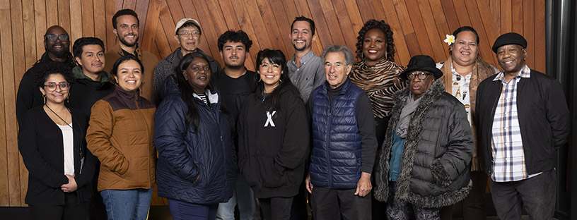 15 Community Advisory Council Members in group portrait