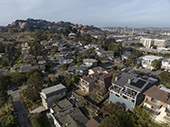 Richmond neighborhood with Chevron structures on hill nearby