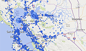 Map of Bay Area with blue spots indicating facilities with toxic emissions