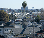 East Oakland urban skyline with freeway